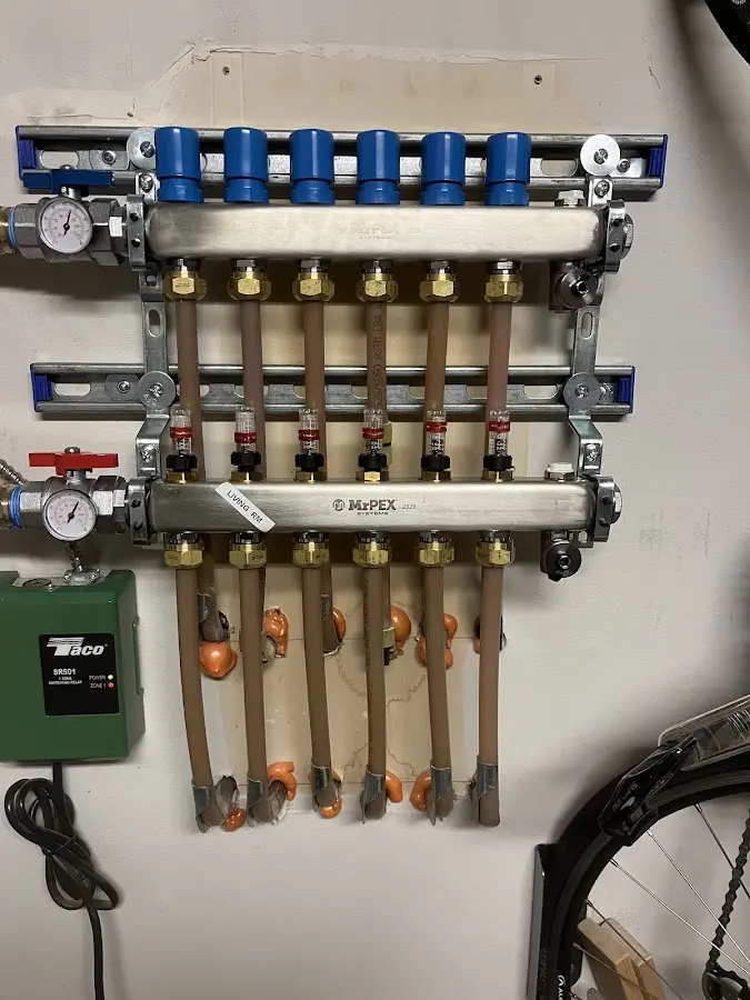 Plumber performing Water Heater Repair at a residential property in Mechanicville